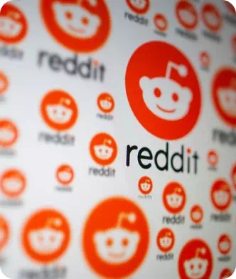 White photo with red Reddit logo